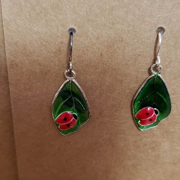 Bundle of 3 pairs of earrings. Very pretty. Green leaves marked Jj jonette Avon - Picture 7 of 9